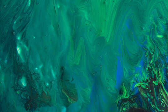 Abstract flow of liquid paints in mix