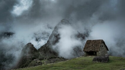 Rural small house in foggy Machu Picchu in Peru