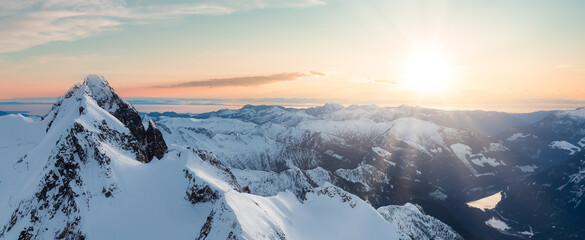 Fototapeta premium Aerial Panoramic View of Canadian Mountain Landscape. Squamish, British Columbia, Canada. Nature Background Panorama. Sunset Sky Art Render