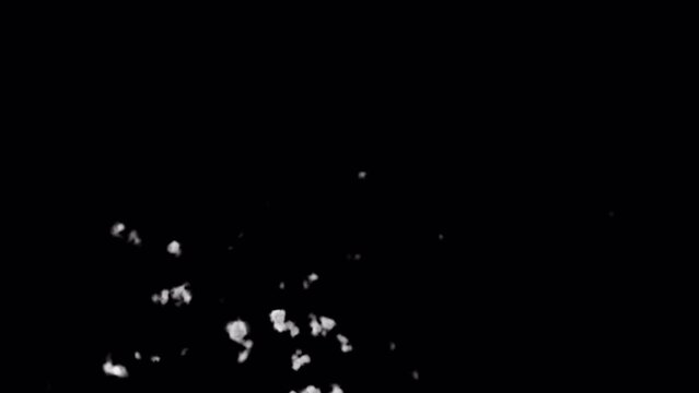 Snow blowing explosion isolated on alpha background in 4K