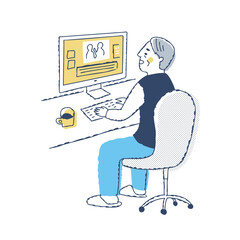 パソコン作業をしているシニア男性