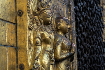 Golden Angel Sculpture in Swayambhunath or Monkey Stupa in Kathmandu, Nepal, is an ancient religious complex atop a hill, The complex consists of a stupa, a variety of shrine and temple