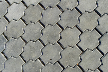 Pavement. Sidewalk tiles background. Pavement tiles. Top view. Closeup. Footpath. Sidewalk
