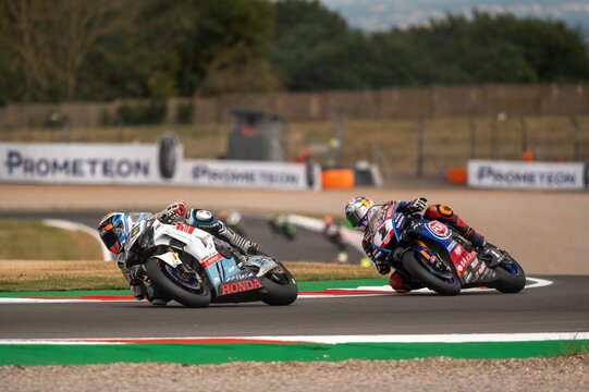 Motorcyclists Racing During The World Super Bikes At Donington Park Circuit