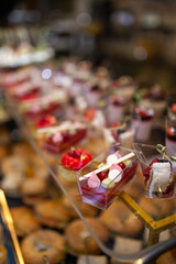 dessert in a plastic basket on the buffet table