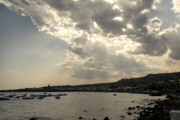  Tramonto sulla baia di Acitrezza