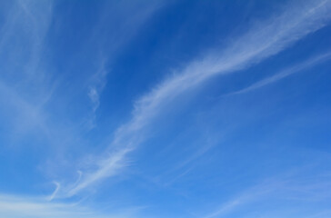 blue sky and gentle streaks of clouds