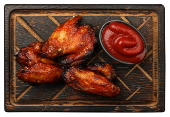Barbecue chicken buffalo wings sauce on wood