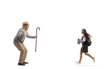 Grandpa waiting to hug schoolgirl granddaughter