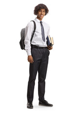 Full length portrait of an african american male student in a college uniform holding books