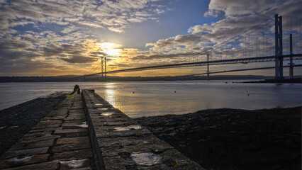 Forth road bridge and queensferry crossing, seen from North queensferry, UK