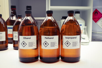 Ethanol, Methanol, Isopropanol in glass, Hazardous chemicals and symbols on containers in industry