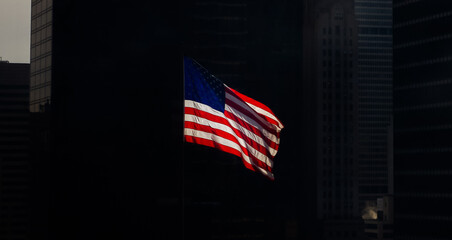 US flag in a beam of light, looking iconic