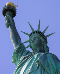 blue sky statue of liberty