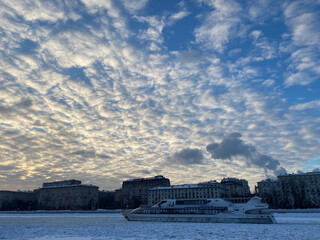 Strong minus in Moscow.
View of the frozen Moskva River, ship and houses in the Khamovniki district...