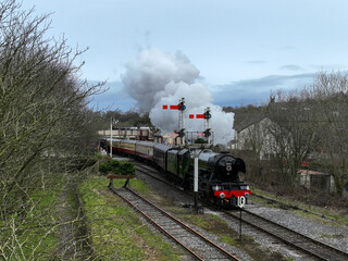 The Flying Scotsman passing through Ramsbottom level crossing 
