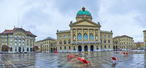 Ensemble of government buildings on Bundesplatz square, with Bundeshaus in the middle in Bern,...