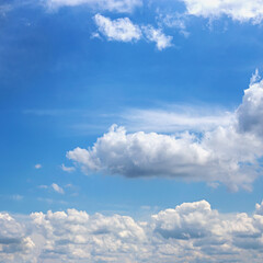 Obraz na płótnie Canvas Beautiful blue sky with white clouds as a natural background.