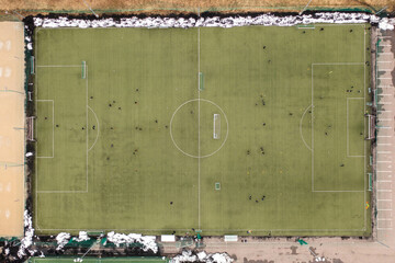 Drone photography of football game practice in soccer field