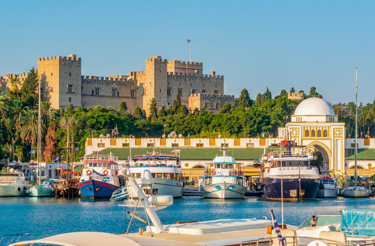 Mandraki harbor with Rhodes fortress and New market (Nea Agora), Rhodes, Greece
