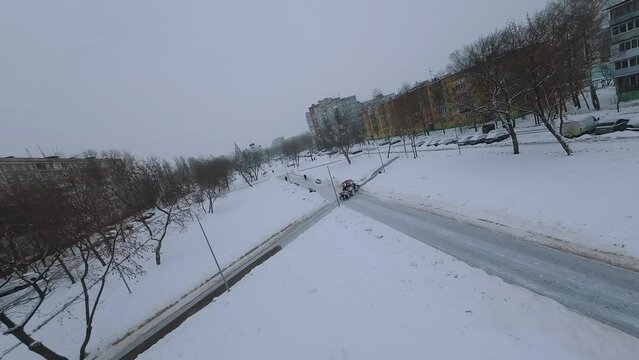 FPV shooting of snow removal equipment, snow removal machine operation, snow removal equipment, mtz tractor removes snow