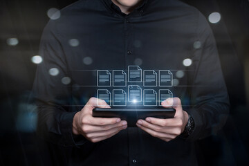 A man shows on the tablet different formats .