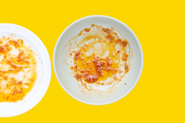 Dirty dishes on yellow background. Top view