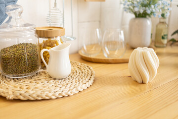 Woven wax candle stands in the kitchen interior