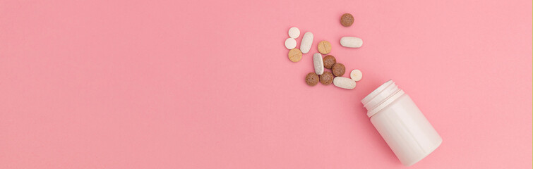Pills on a pink background, pharmacy products banner