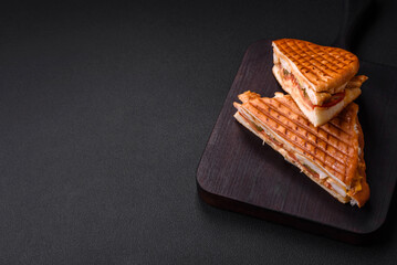 Delicious crispy sandwich with chicken breast, tomatoes, ketchup and spices