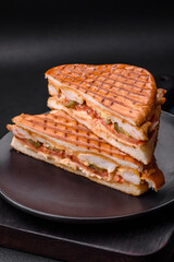 Delicious crispy sandwich with chicken breast, tomatoes, ketchup and spices