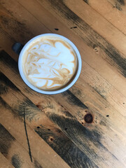 cup of coffee on wooden table