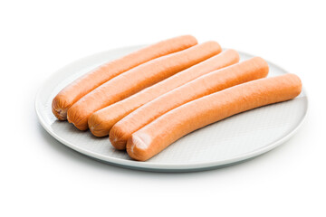 Tasty sausages. Frankfurters on plate isolated on white background.
