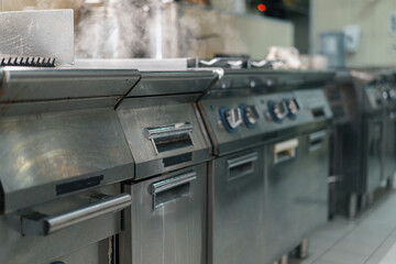 professional kitchen in a hotel restaurant kitchen utensils interior cooking stove