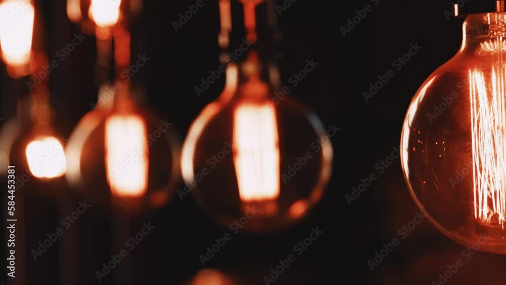 Poster decorative light bulbs on a cord. horizontal camera movement