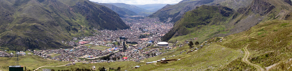 HUANCAVELICA, PERU - MARCH 23, 2023: Panoramic view of the city of Huancavelica from the foot of Cerro Tesorero. Photograph made before of the most distant houses.