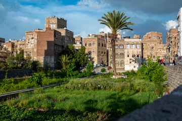 Foto op Plexiglas Vegetable garden among traditional architecture . Inhabited for more than 2.500 years, the Old City of Sanaa is a UNESCO World Heritage City © Mostafa-pic