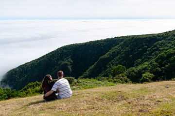Fototapeta na wymiar Madeira holiday summer trip vacation tourism mountains sunny day green trees landscape happy couple