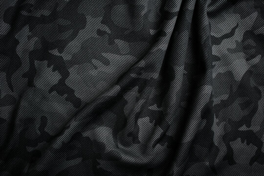 Camouflage pattern. Trendy dark gray camouflage fabric. Military texture. Dark back.