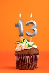 Birthday cake with candle number 13 - Orange foamy background