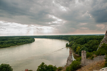 The Danube River with the walls of Devin Castle in the foreground in Bratislava, Slovakia