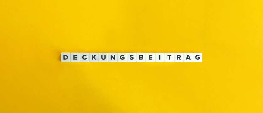 Deckungsbeitrag (Contribution margin-based pricing in German Language). Letter Tiles on Yellow Background. Minimal Aesthetics.