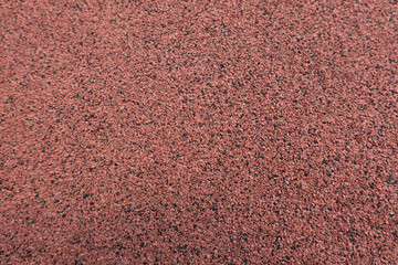 Fototapeta premium Ruberoid texture of roofing material bituminous coating background. Abstract roofing material surface material closeup