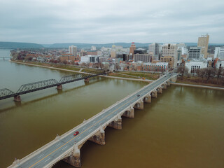 Aerial drone view of cityscape and bridges. 