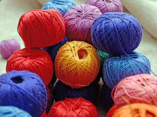 multi-colored skeins of thread. needlework threads, close-up