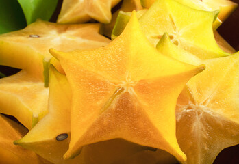 Star fruit or carambola Sliced ​​ripe star mimosa or star apple on white background  is native...