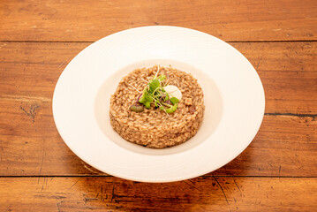 Sticky rice is a preparation of rice with an intermediate cooking point, between dry and brothy rice