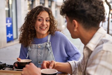 Friends from different cultures enjoy coffee and tea together.