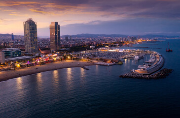 Obraz premium Top view of the evening Barcelona, the capital of the autonomous region of Catalonia, located on the Mediterranean coast, ..Spain