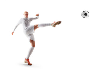 Soccer kick. Isolated. The football player hit the ball. Professional soccer player hits the ball for the winning goal